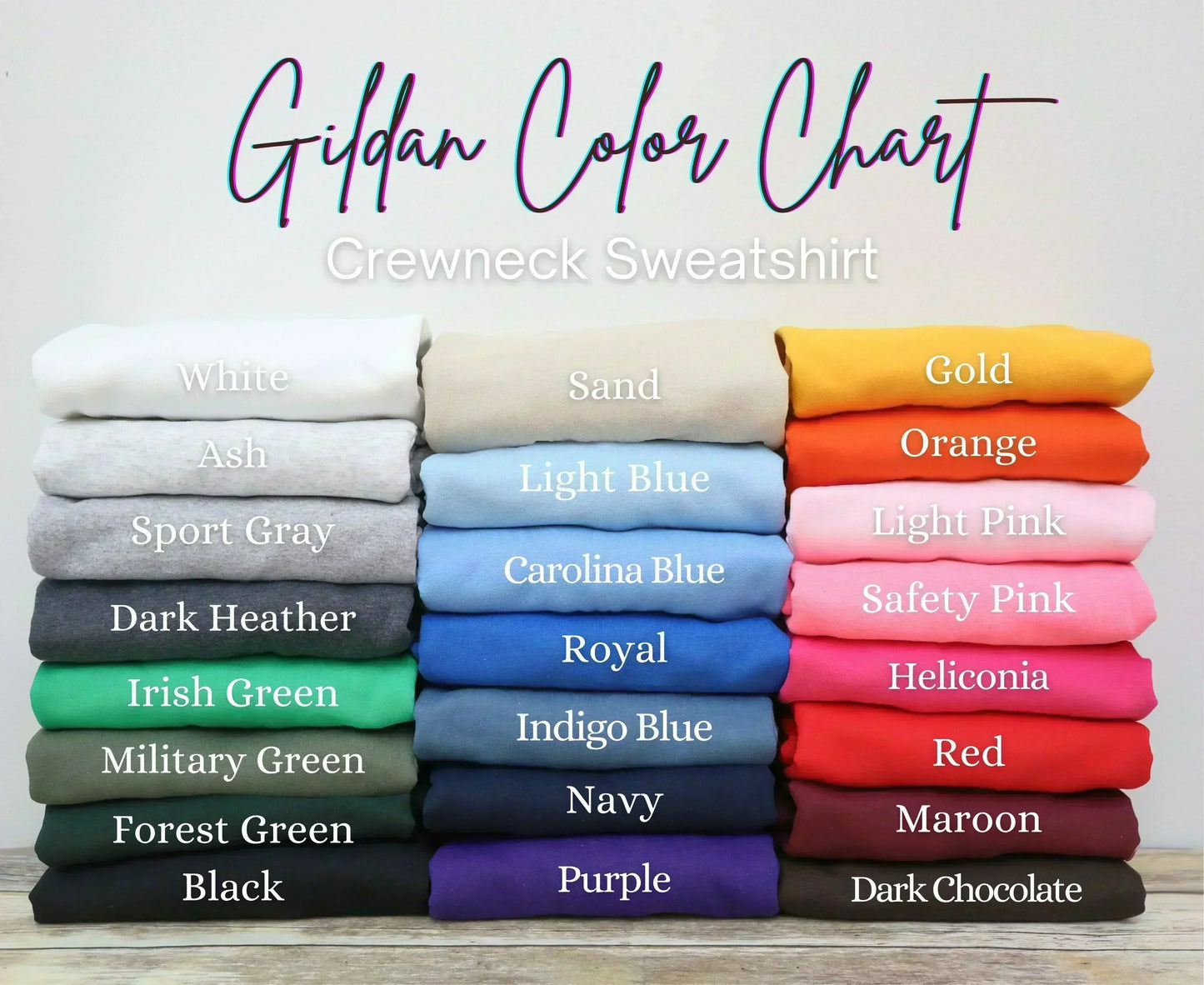 Gildan Color Chart for Grewneck Sweatshirt with various colors stacked on a light gray background.