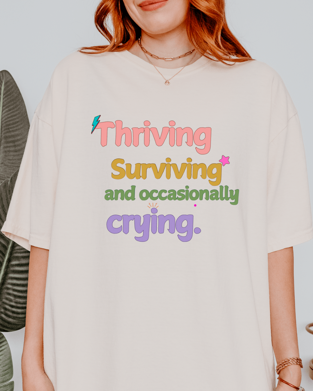 Thriving, Surviving and Occasionally Crying Graphic Tee