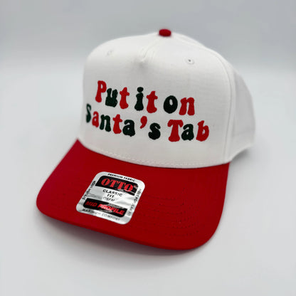 Put It On Santa’s Tab Embroidered Trucker Hat | Funny Christmas Hat | Holiday Trucker Hat | Santa Hat for Women | Cute Holiday Gift