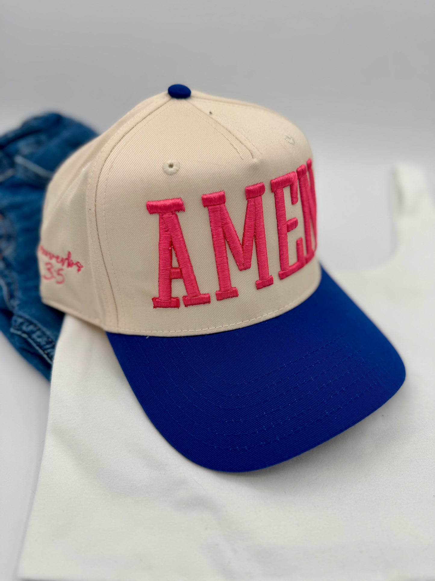 Amen embroidered hat in hot pink with blue bill