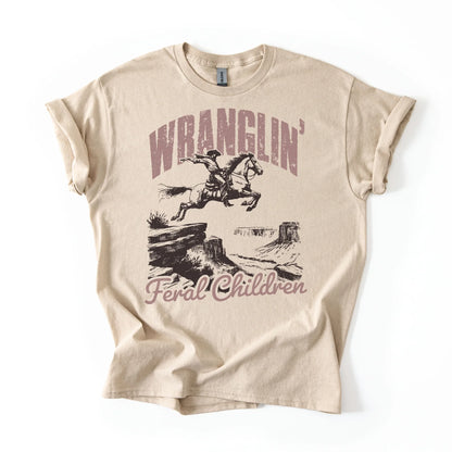 Wranglin’ Feral Children T-Shirt | Funny Western Mom Shirt | Country Mama Tee | Parenting Humor Graphic Tee | Chaos Coordinator Shirt