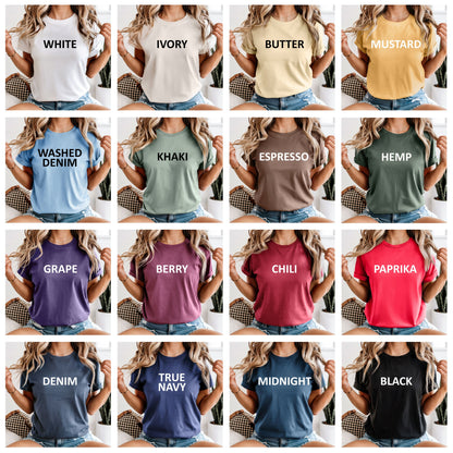 Grid of people wearing t-shirts in various colors with color names printed on them.