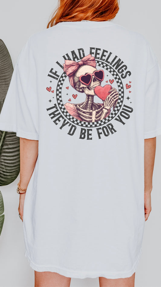 Person wearing a white t-shirt with a skeleton design and text on the back.