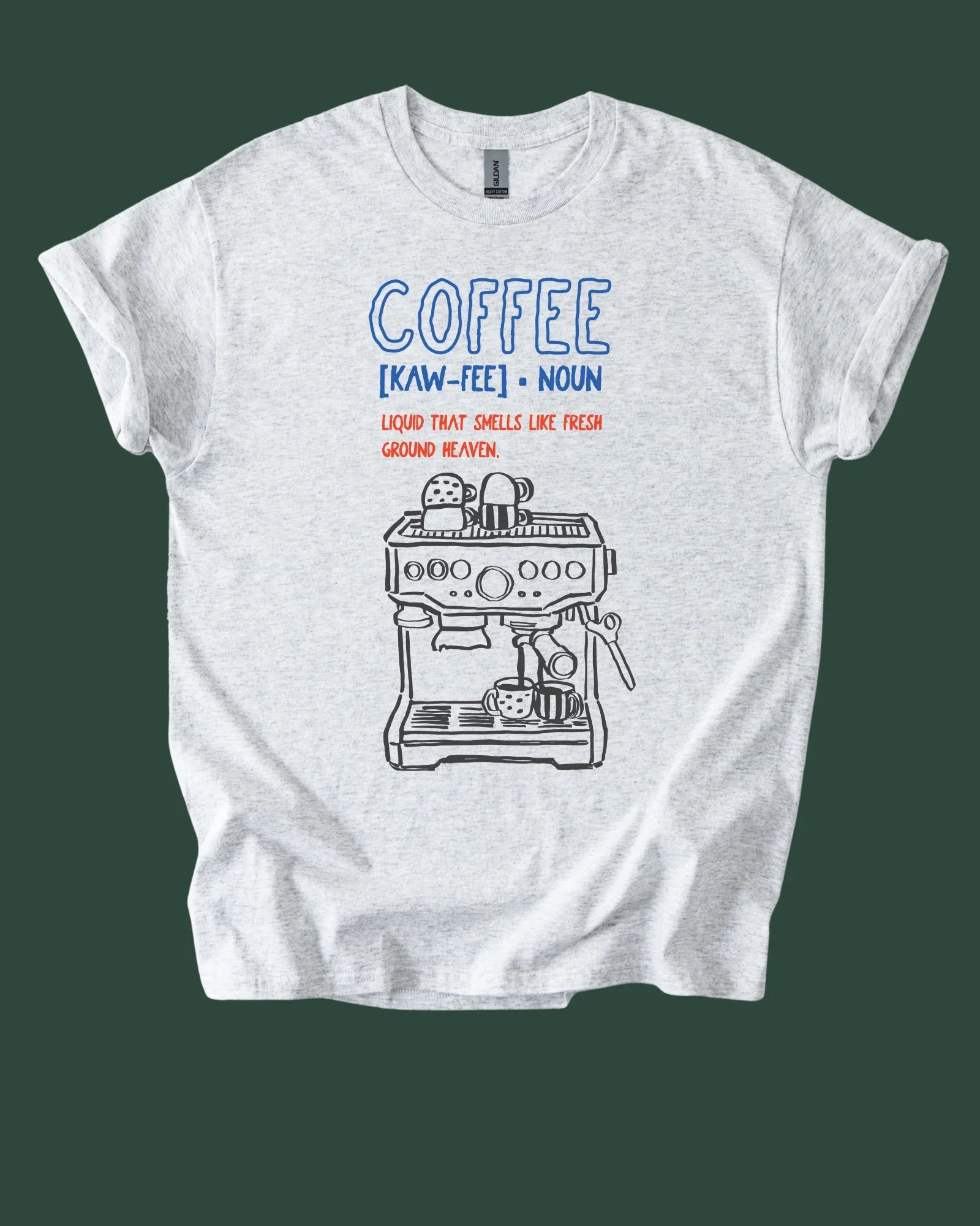 White t-shirt with coffee-themed graphic and definition on a green background