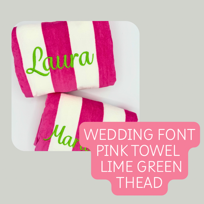 Pink and white striped towel with 'Laura' and 'Man' text on a gray background