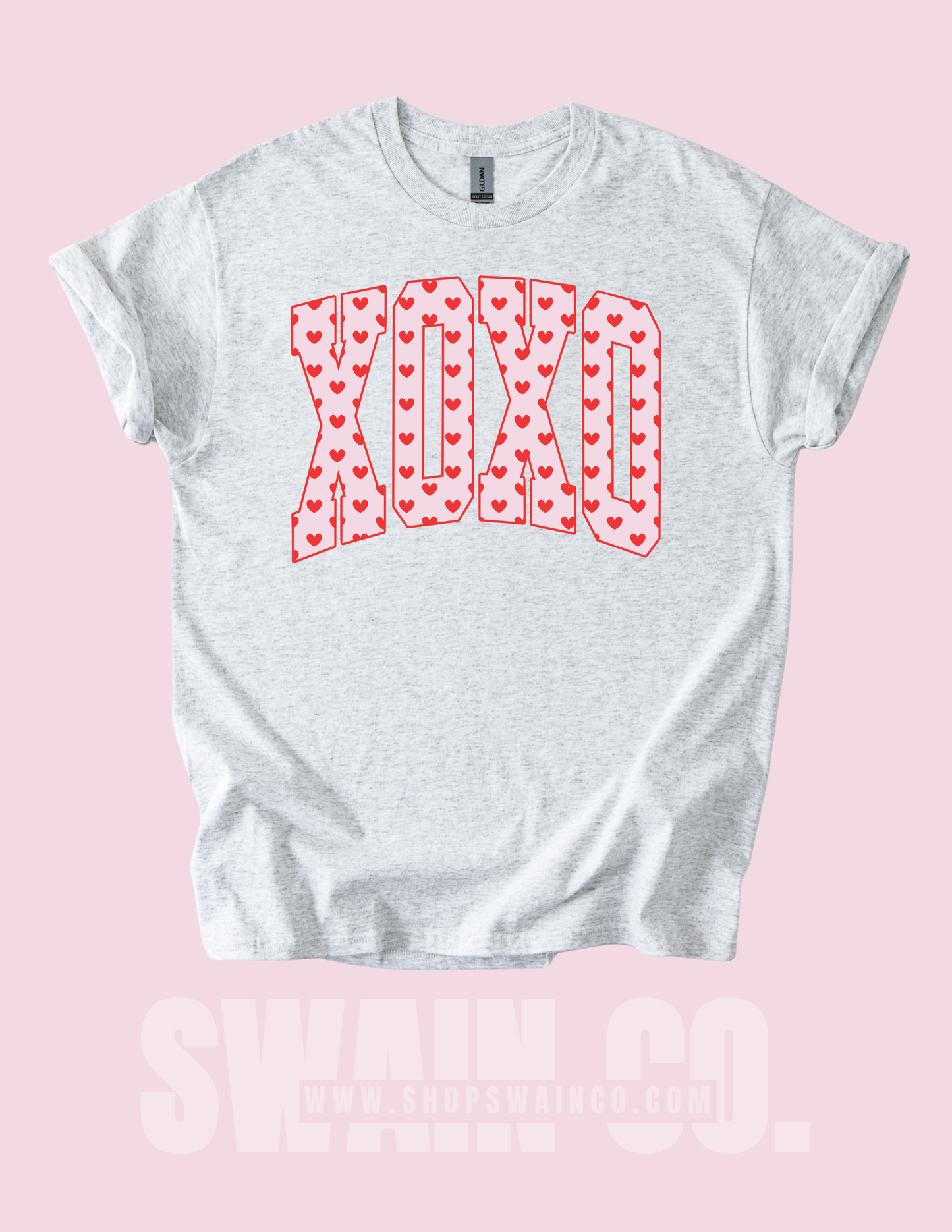 Gray t-shirt with 'XOXO' design on a pink background