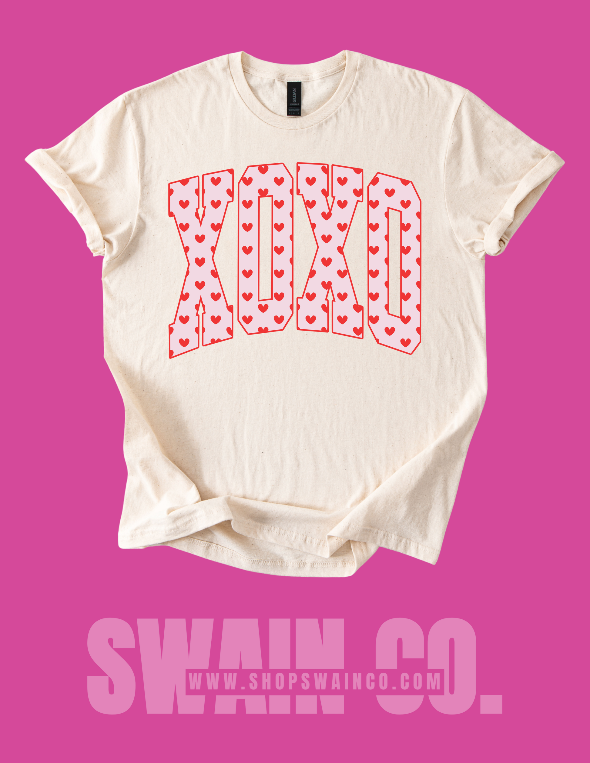 White t-shirt with 'XOXO' print on a pink background, featuring the Swain Co. brand.