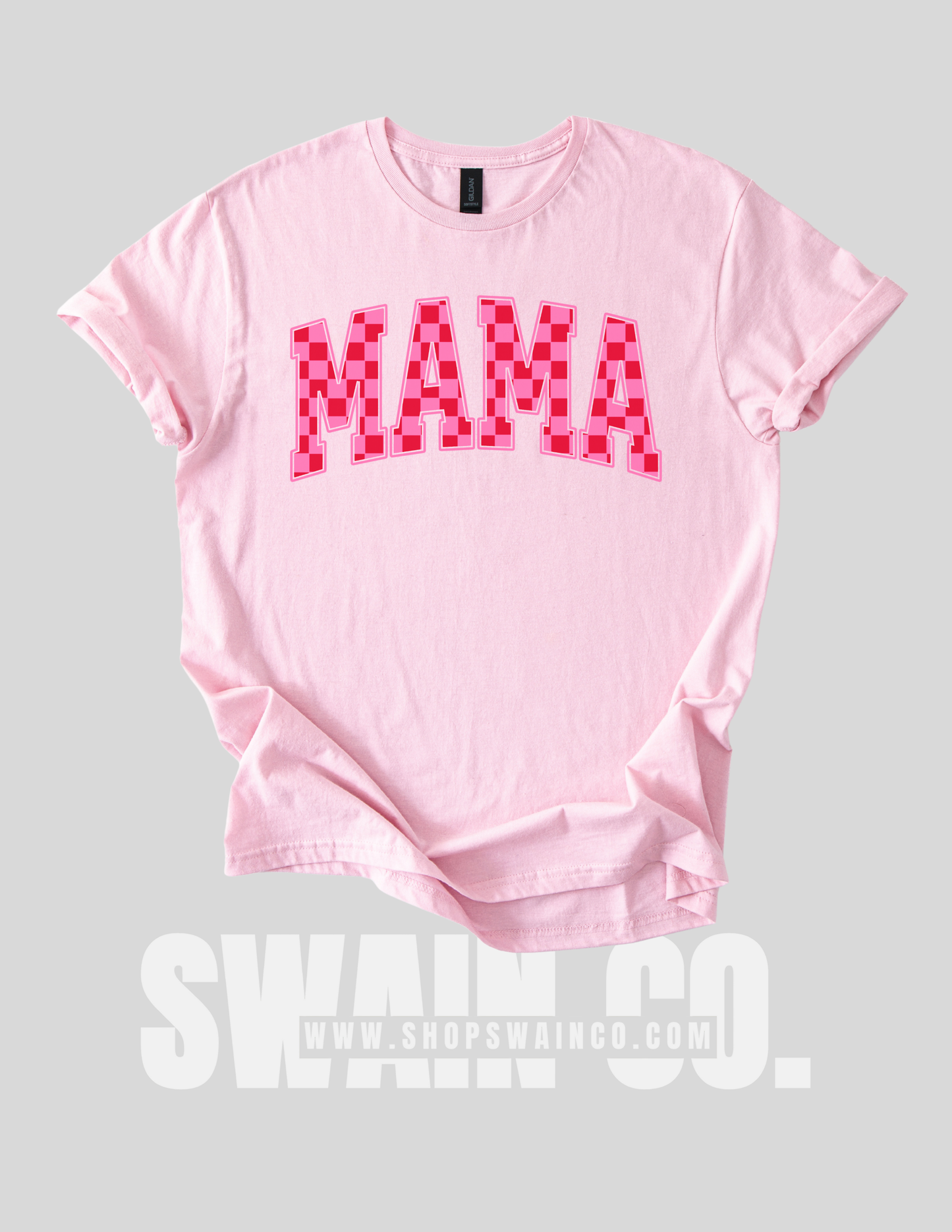 Pink t-shirt with 'MAMA' printed in red on a gray background, featuring the brand Swain Co.
