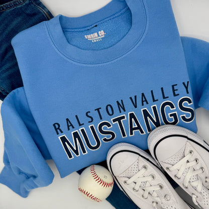 Blue sweatshirt with 'Ralston Valley Mustangs' text, white sneakers, and baseball on a light background