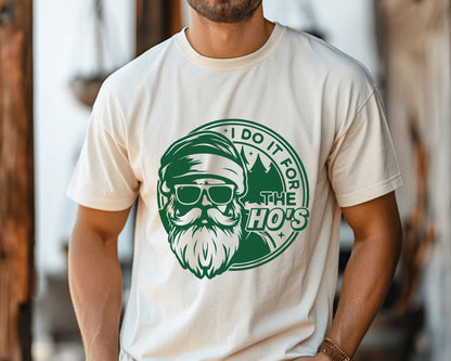 Person wearing a white t-shirt with a green graphic design featuring a bearded character and text.
